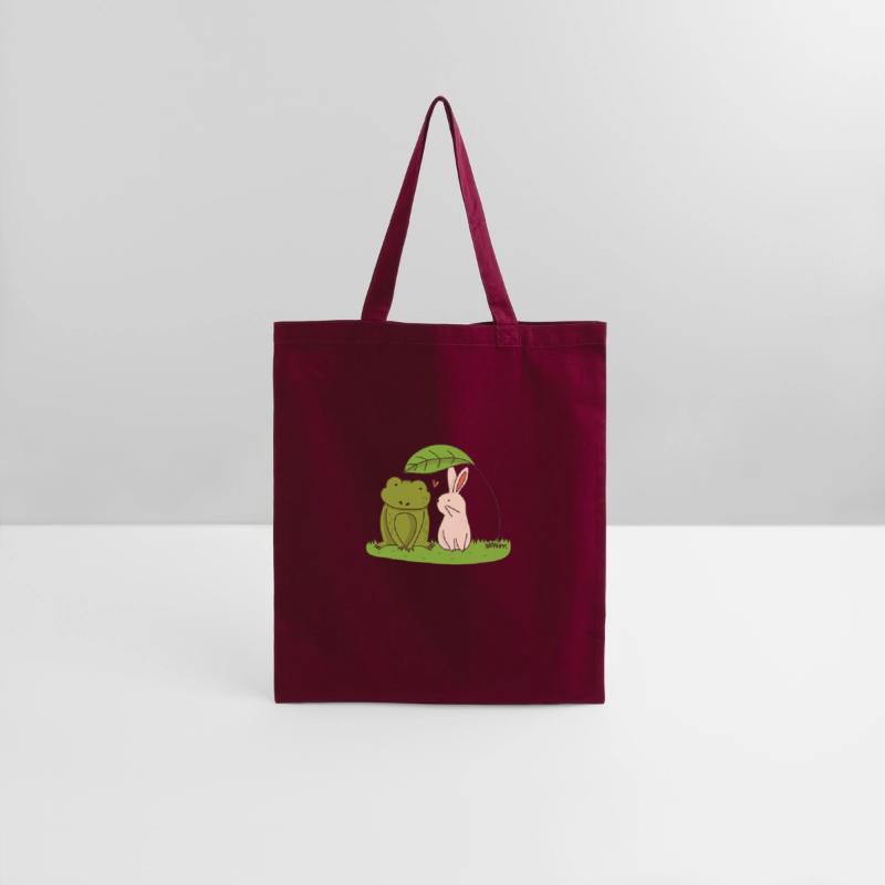 Rabbit and frog under a leaf