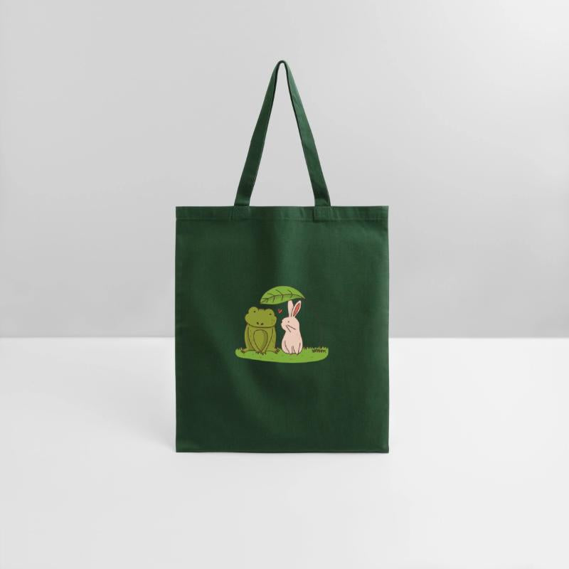 Rabbit and frog under a leaf