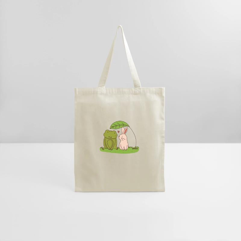 Rabbit and frog under a leaf